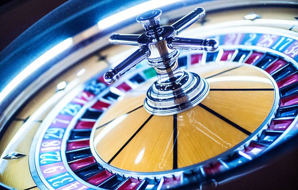 Live casino table view on iOS showing dealer and betting interface